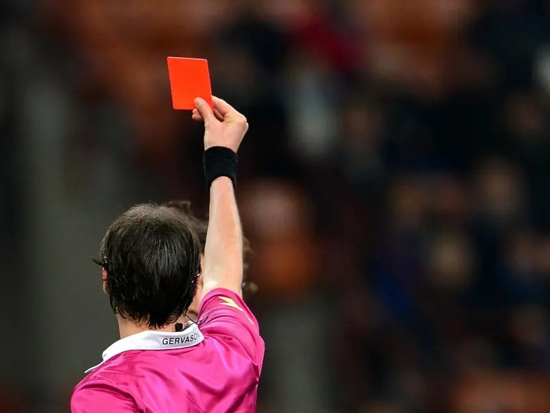 Red card suspension for how many matches in a football competition?